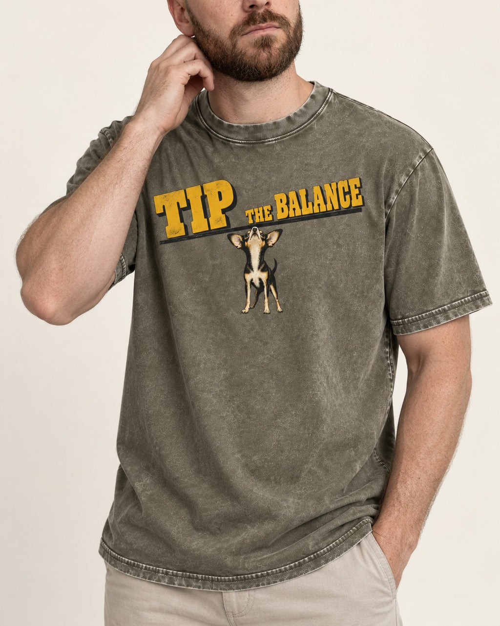 Chihuahua Tip the Balance Beam Graphic Washed Tee in Army Green, worn by a model, front view