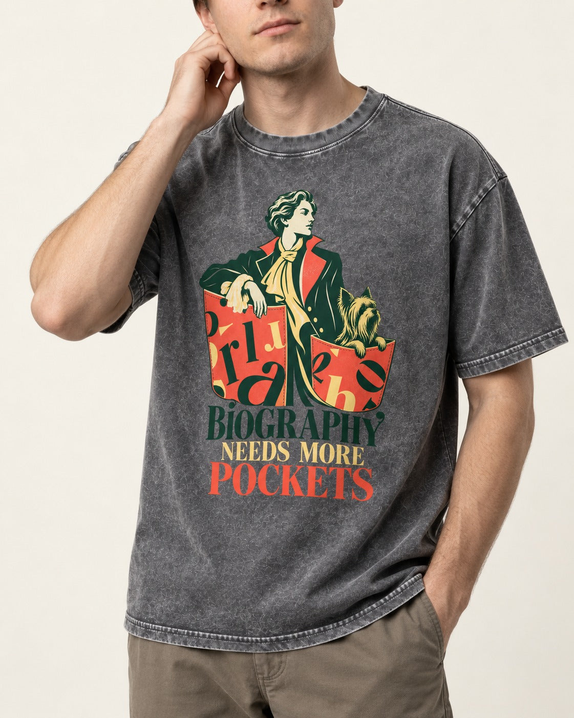 Yorkshire Terrier Biography Needs More Pockets Literary Portrait Graphic Washed Tee in Gray, worn by a model, front view