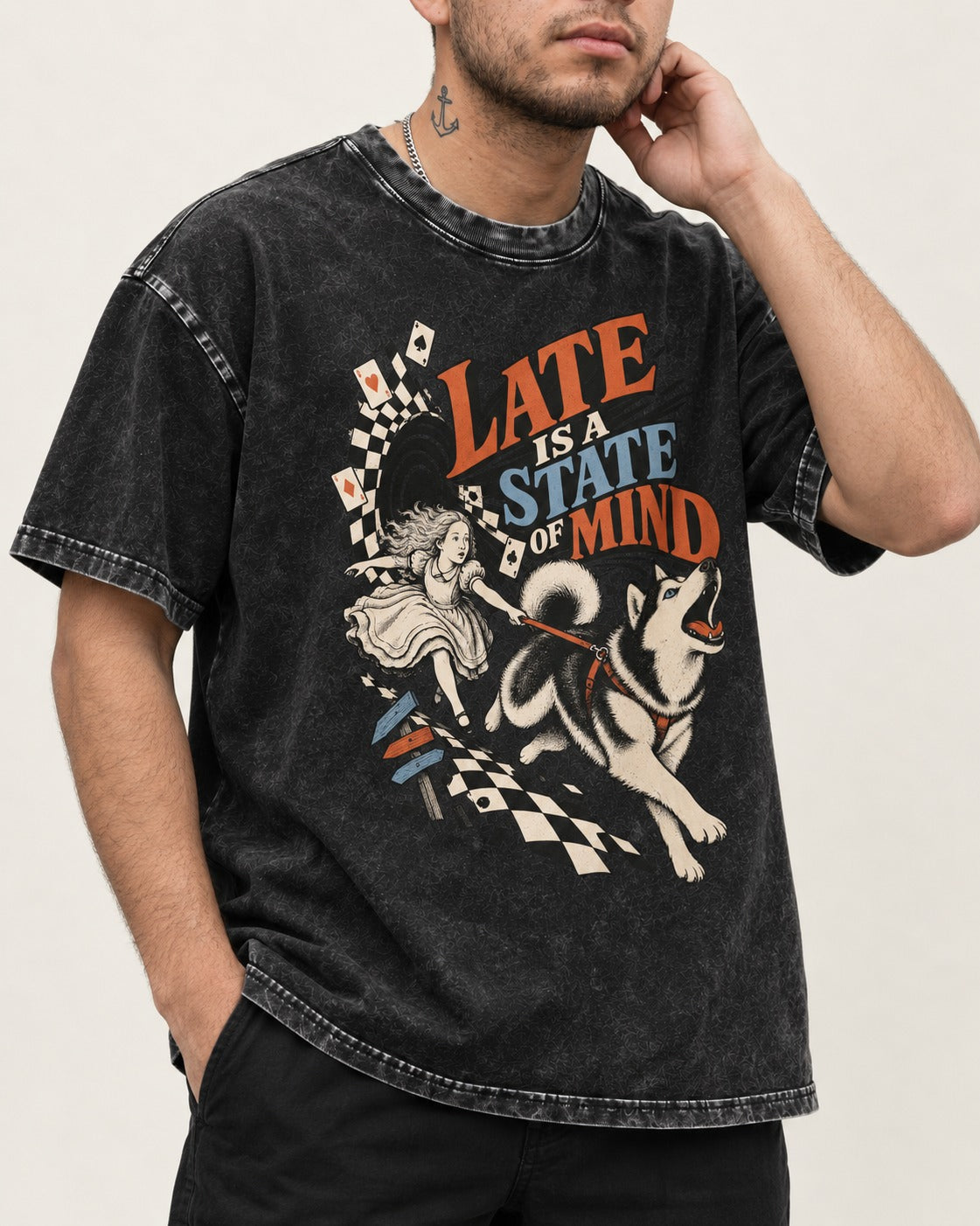 Husky Late Is a State of Mind Wonderland Chase Graphic Washed Tee in Black, worn by a model, front view