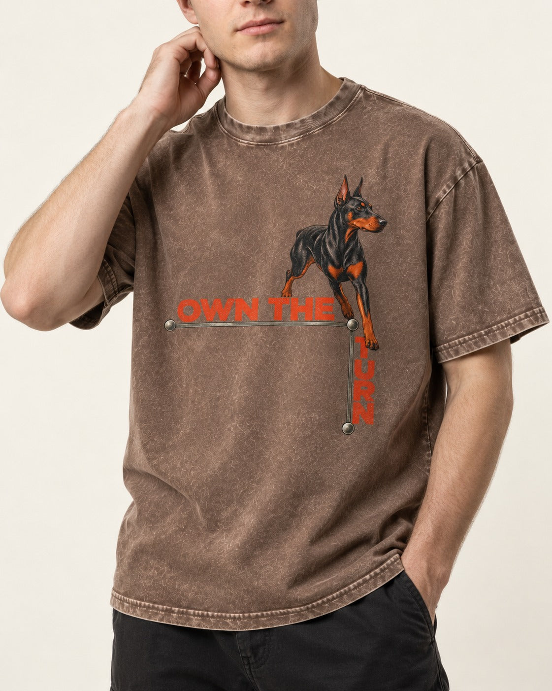 Own the Turn Doberman Washed Tee in Coffee, worn by a model, front view