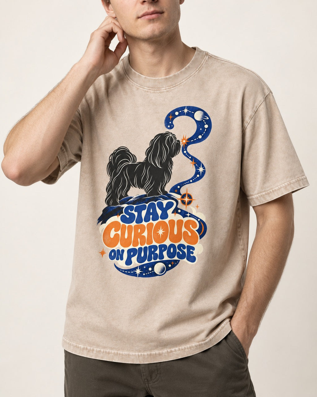 Stay Curious on Purpose Shih Tzu Washed Tee in Apricot, worn by a model, front view