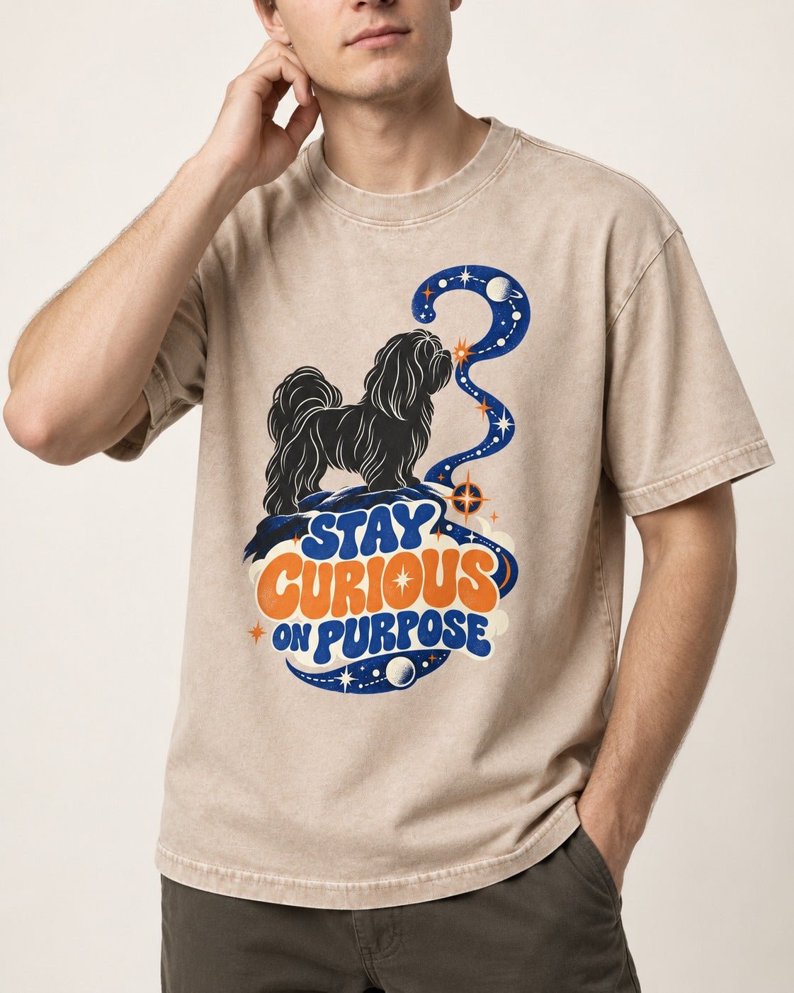 Stay Curious on Purpose Shih Tzu Washed Tee in Apricot, worn by a model, front view