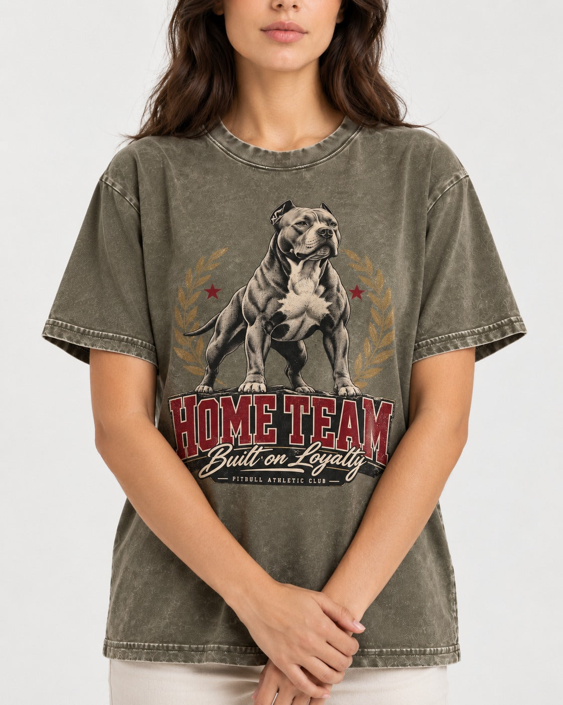 Pitbull Home Team Loyalty Crest Graphic Washed Tee in Army Green, worn by a model, front view