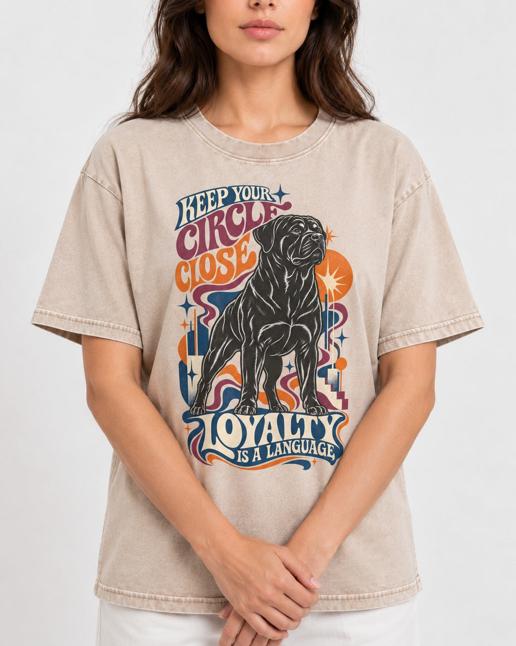 Keep Your Rottweiler Circle Close Washed Tee in Apricot, worn by a model, front view