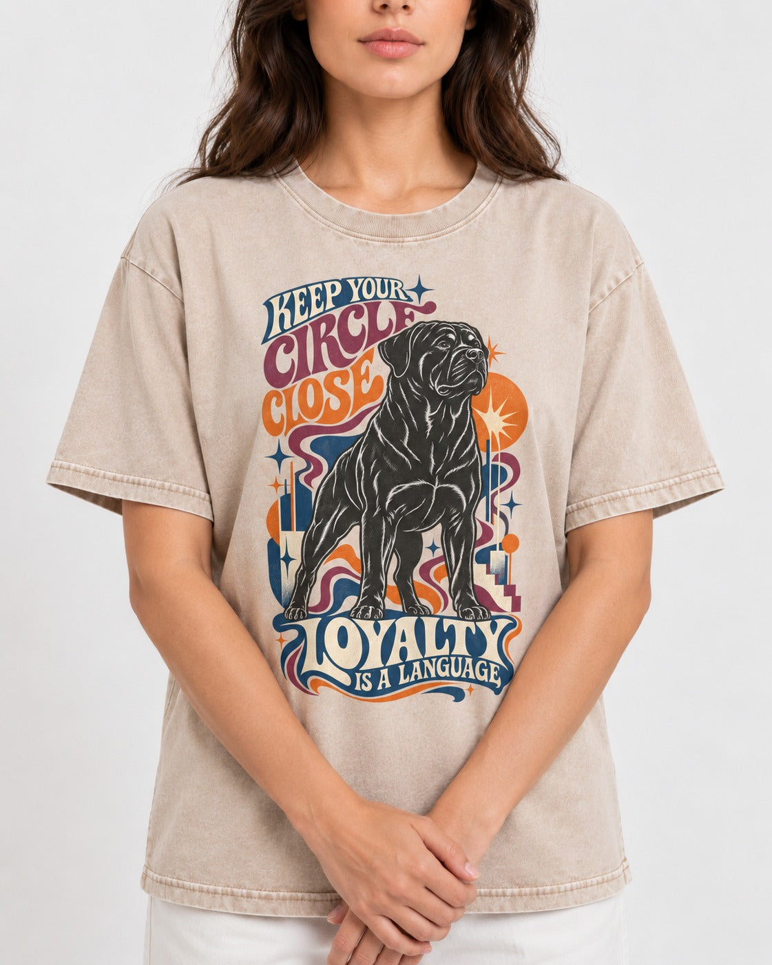 Keep Your Rottweiler Circle Close Washed Tee in Apricot, worn by a model, front view