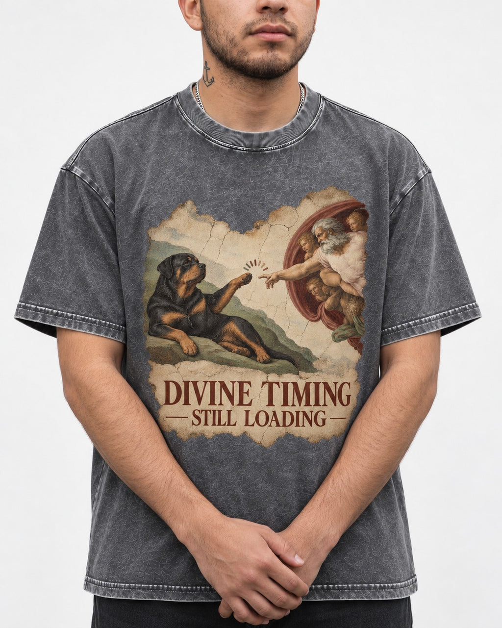 Rottweiler Divine Timing Still Loading Creation Parody Graphic Washed Tee in Gray, worn by a model, front view