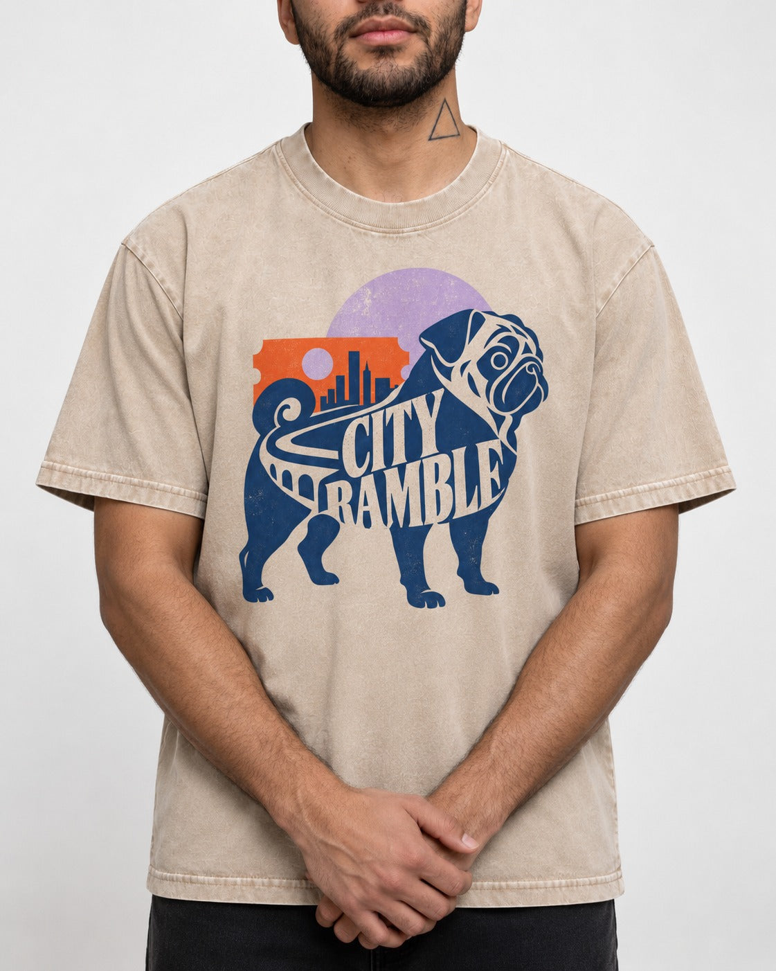 Pug's Big City Ramble Washed Tee in Apricot, worn by a model, front view