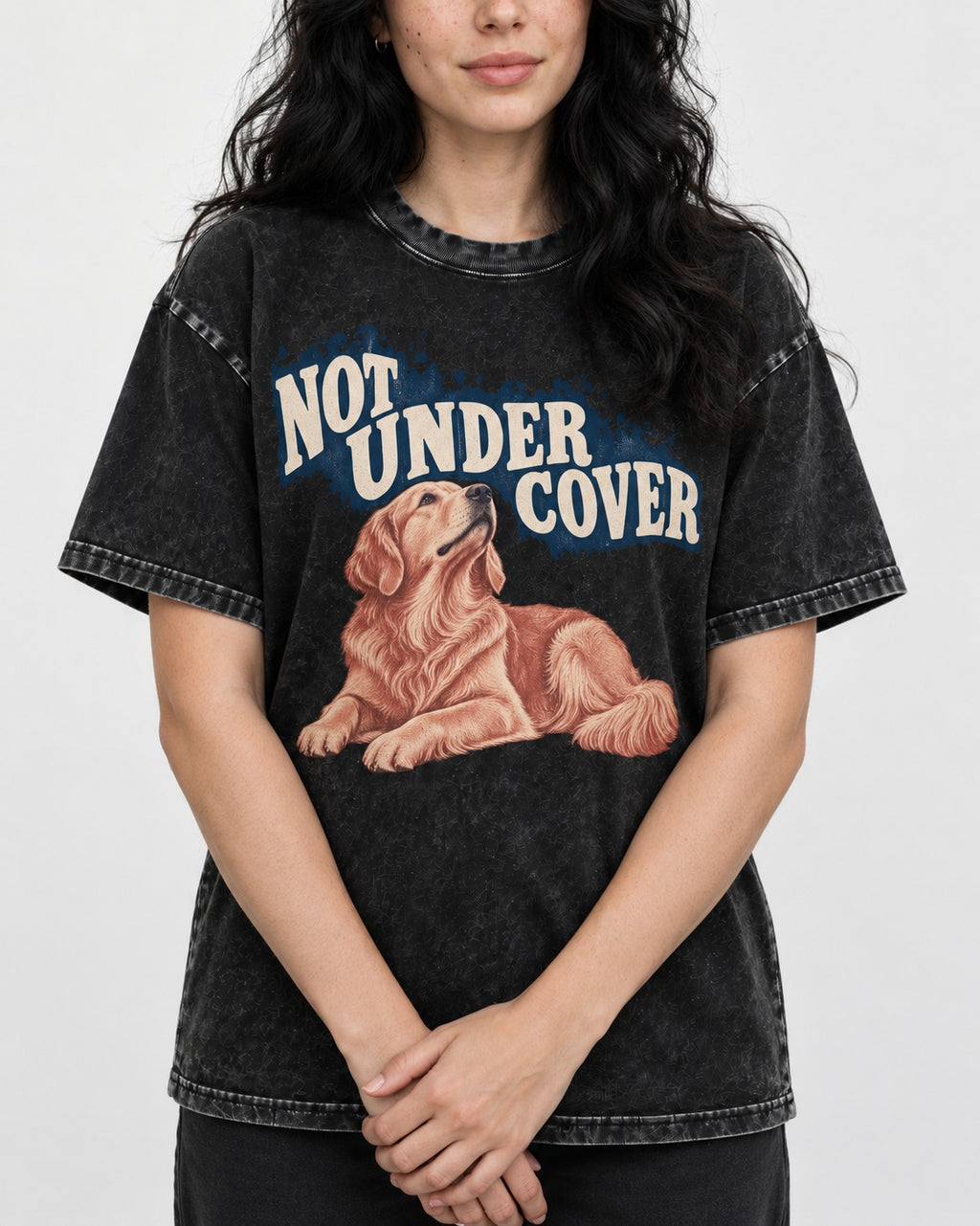 Not Under Cover Reclining Golden Retriever Graphic Washed Tee in Black, worn by a model, front view
