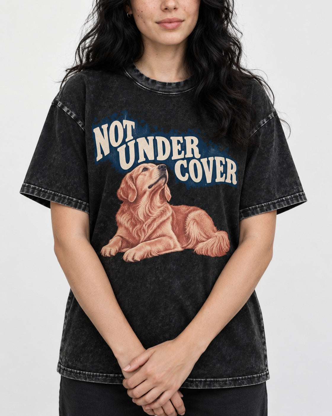 Not Under Cover Reclining Golden Retriever Graphic Washed Tee in Black, worn by a model, front view