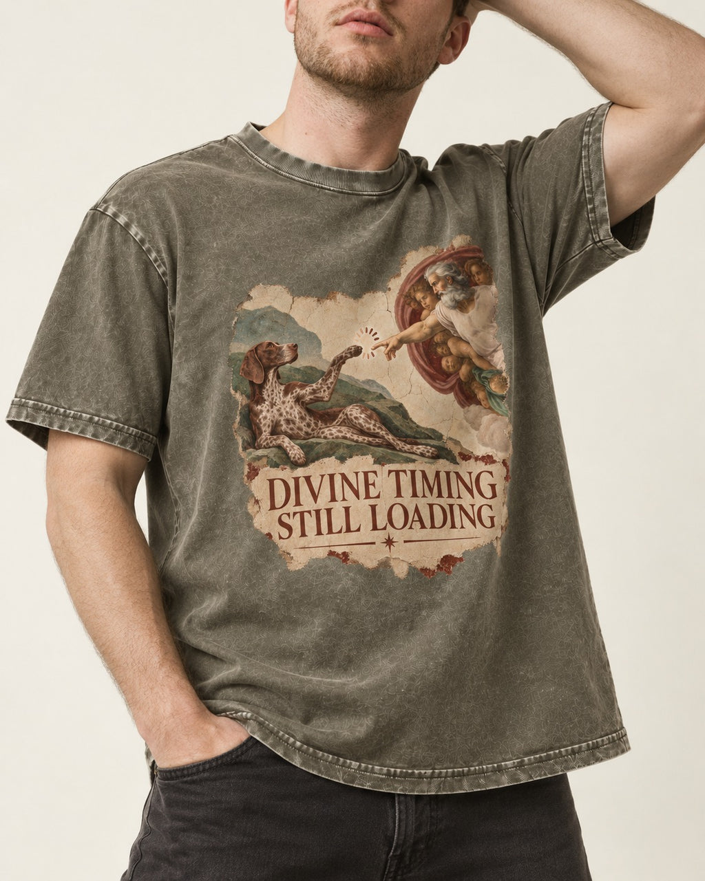 German Shorthaired Pointer Divine Timing Still Loading Creation Scene Graphic Washed Tee in Army Green, worn by a model, front view