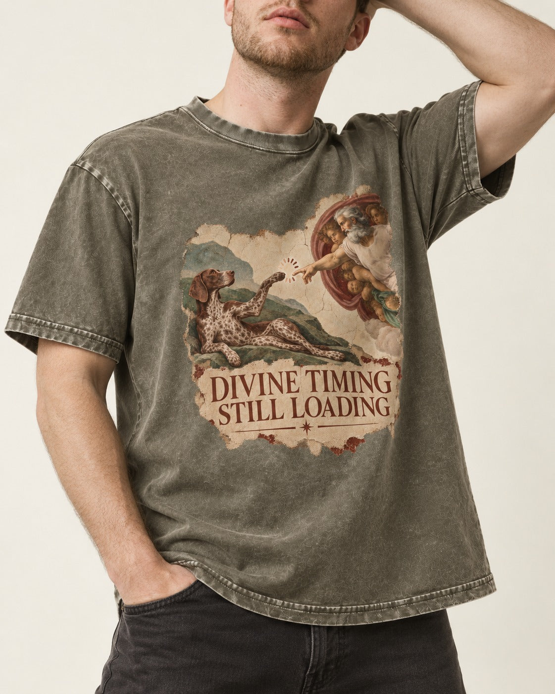 German Shorthaired Pointer Divine Timing Still Loading Creation Scene Graphic Washed Tee in Army Green, worn by a model, front view