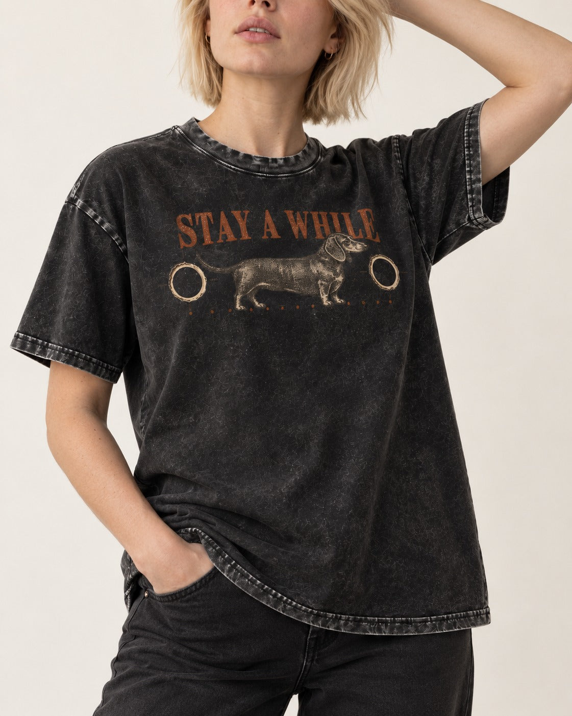 Dachshund Stay A While Ornamental Portrait Graphic Washed Tee in Black, worn by a model, front view