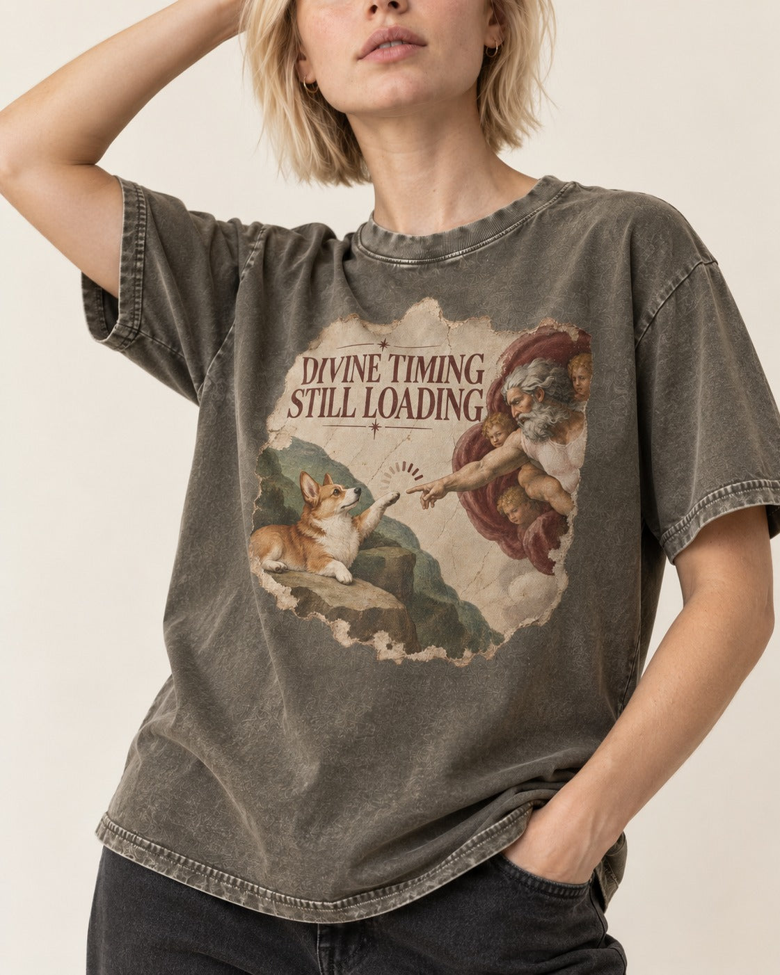 Corgi Divine Timing Still Loading Creation Parody Washed Tee in Army Green, worn by a model, front view