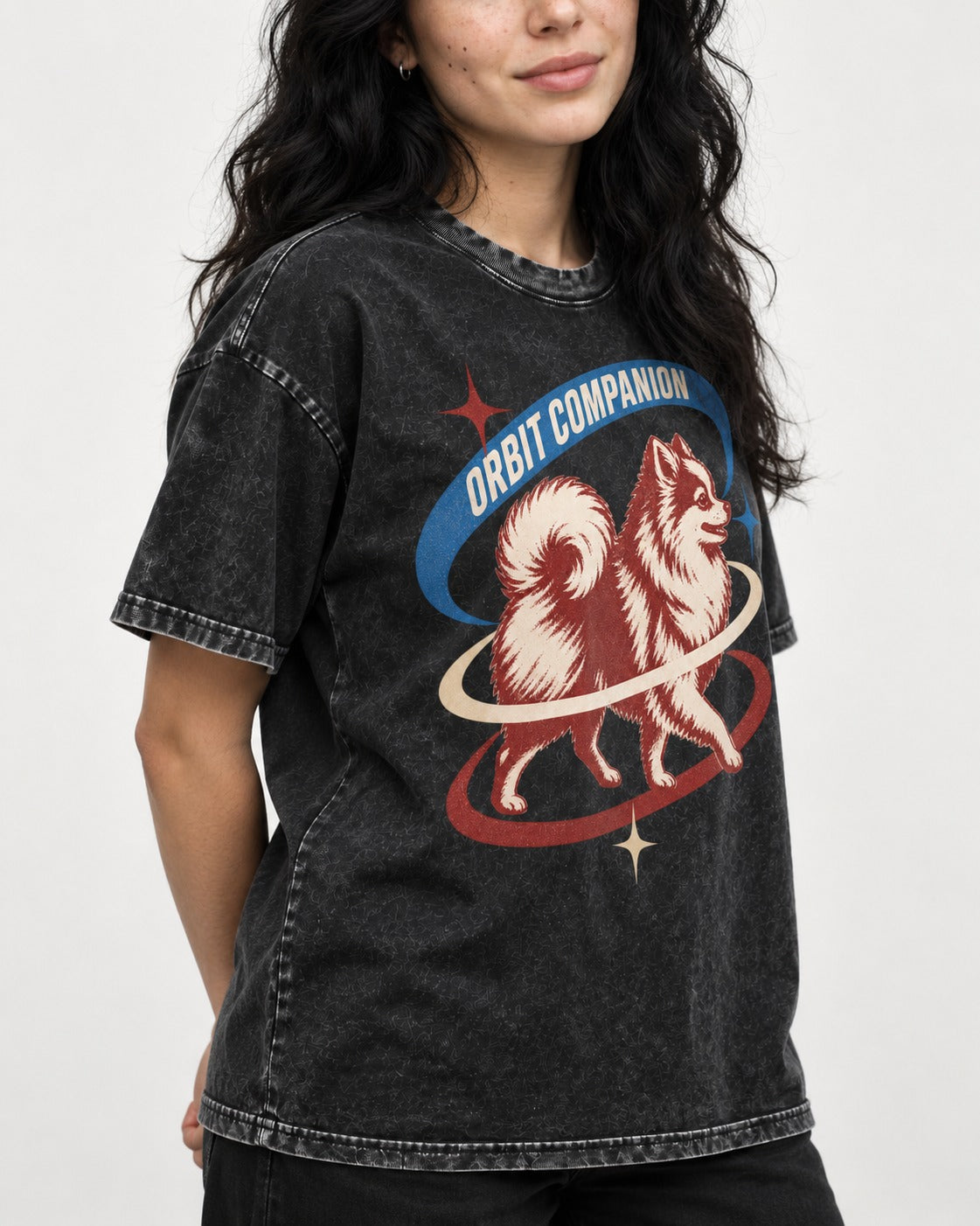 Pomeranian Orbit Companion Retro Space Graphic Washed Tee in Black, worn by a model, front view