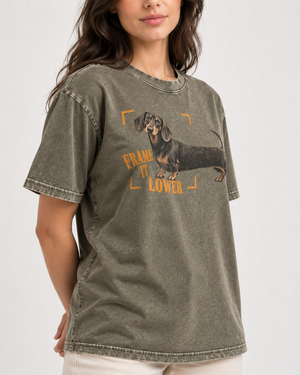 Dachshund Frame It Lower Viewfinder Graphic Washed Tee in Army Green, worn by a model, front view