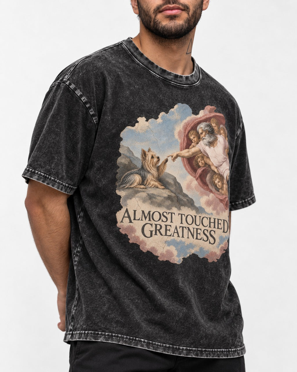 Yorkshire Terrier Almost Touched Greatness Creation Parody Graphic Washed Tee in Black, worn by a model, front view