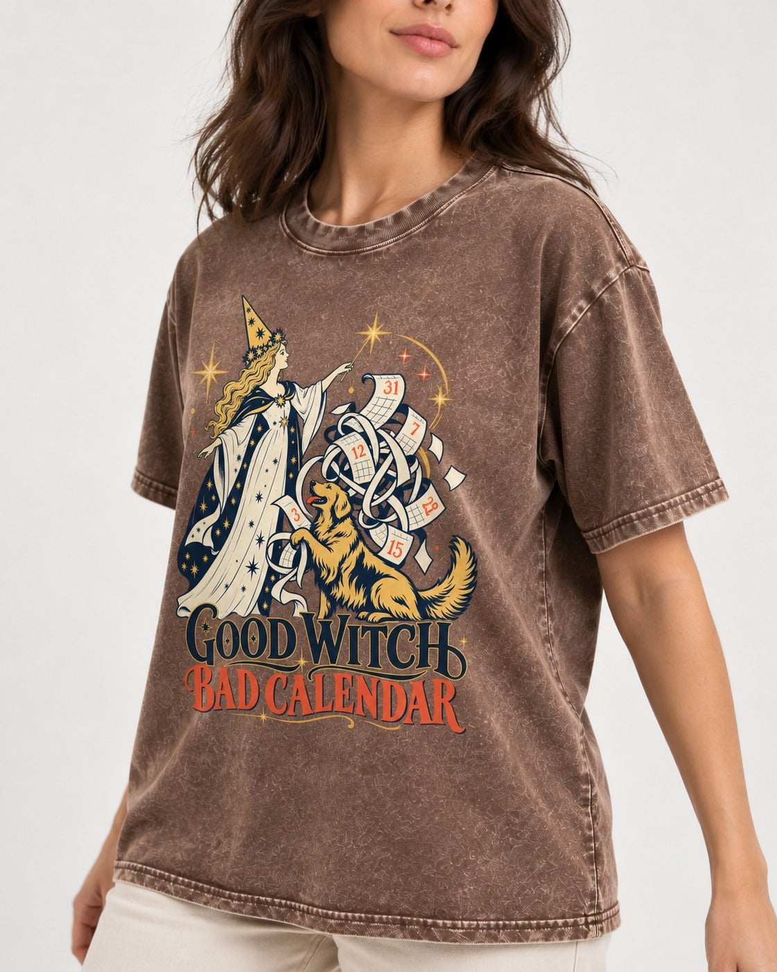 Good Witch Bad Calendar Golden Retriever Washed Tee in Coffee, worn by a model, front view