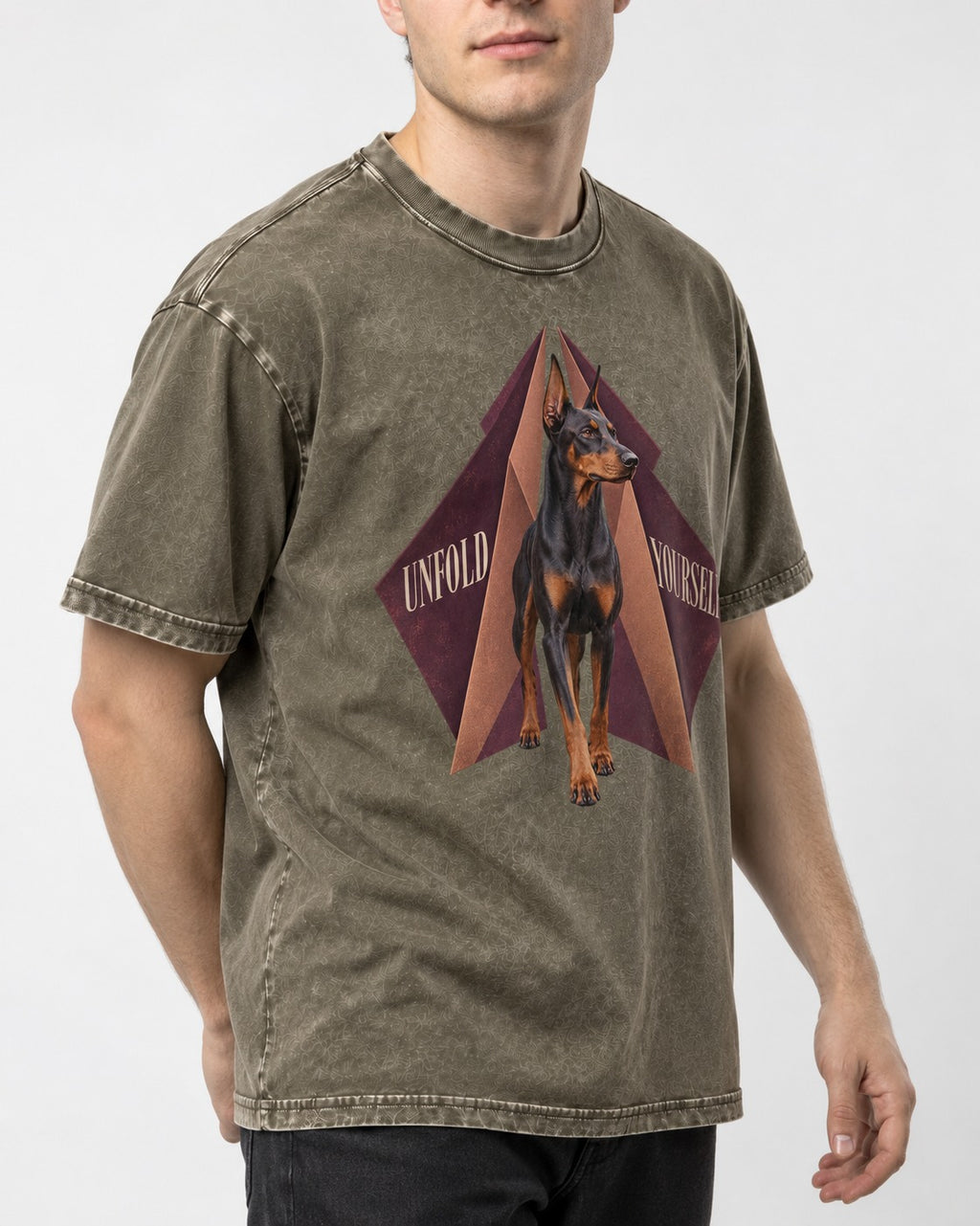Doberman Unfold Yourself Geometric Portrait Graphic Washed Tee in Army Green, worn by a model, front view