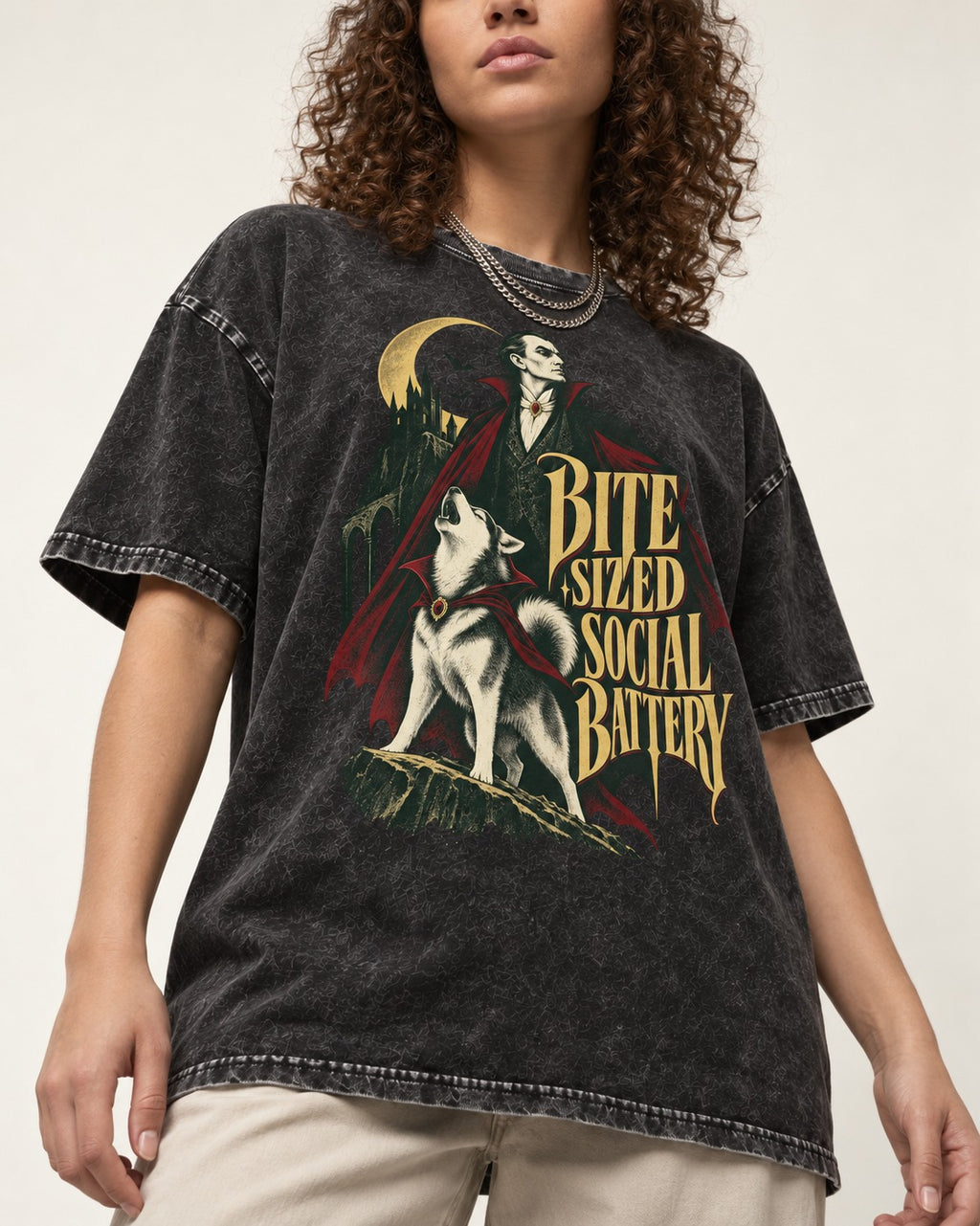 Husky Bite Sized Social Battery Vampire Graphic Washed Tee in Black, worn by a model, front view