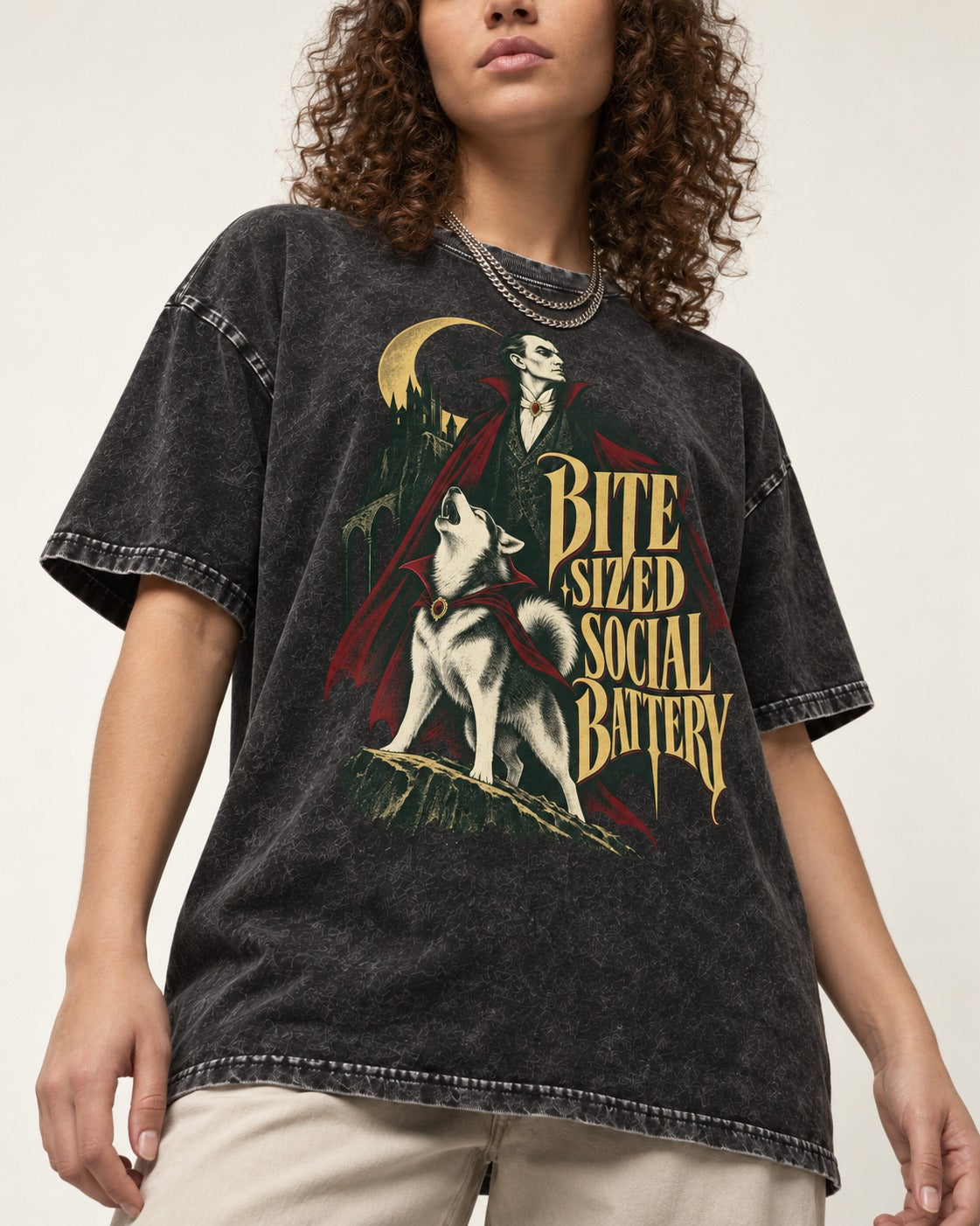 Husky Bite Sized Social Battery Vampire Graphic Washed Tee in Black, worn by a model, front view
