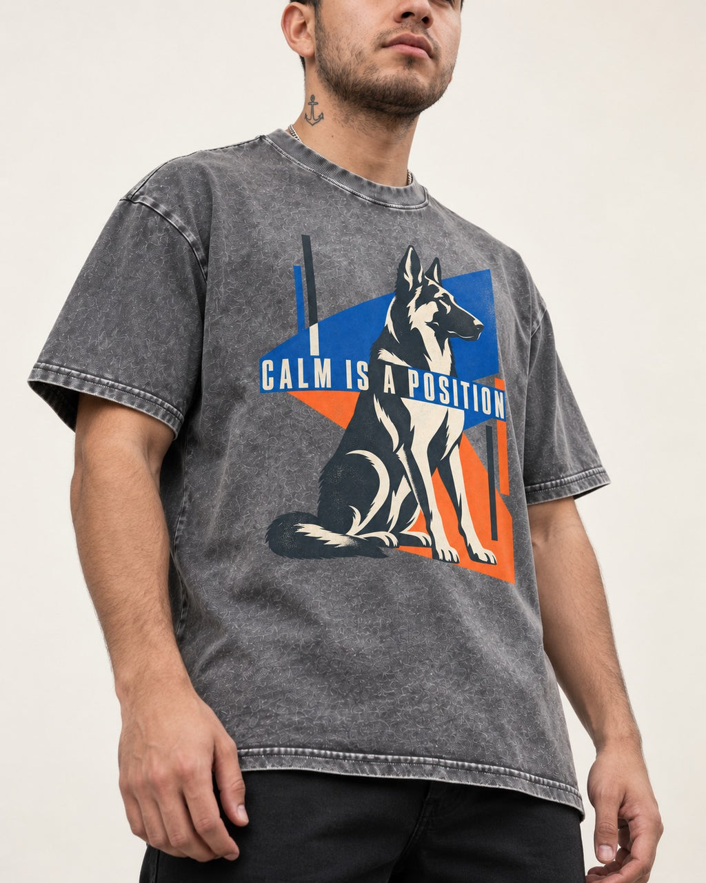 Calm Is A Position Geometric German Shepherd Dog Graphic Washed Tee in Gray, worn by a model, front view