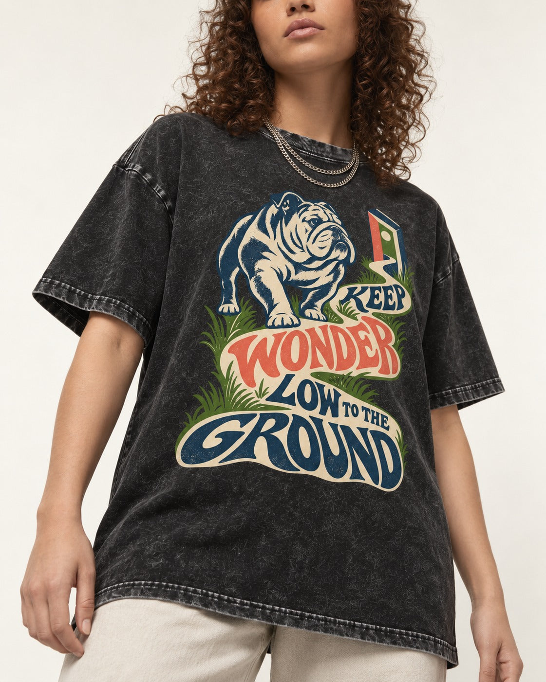 Keep Wonder Low to the Ground English Bulldog Graphic Washed Tee in Black, worn by a model, front view