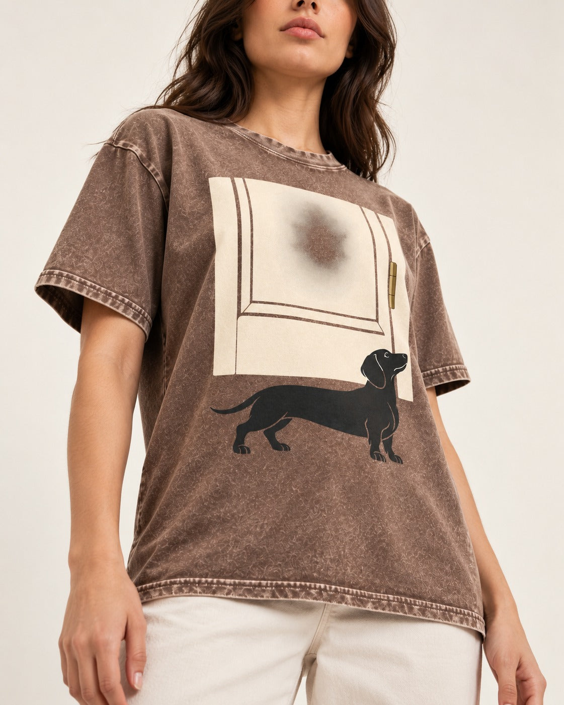 Dachshund Frosted Door Sentinel Graphic Washed Tee in Coffee, worn by a model, front view