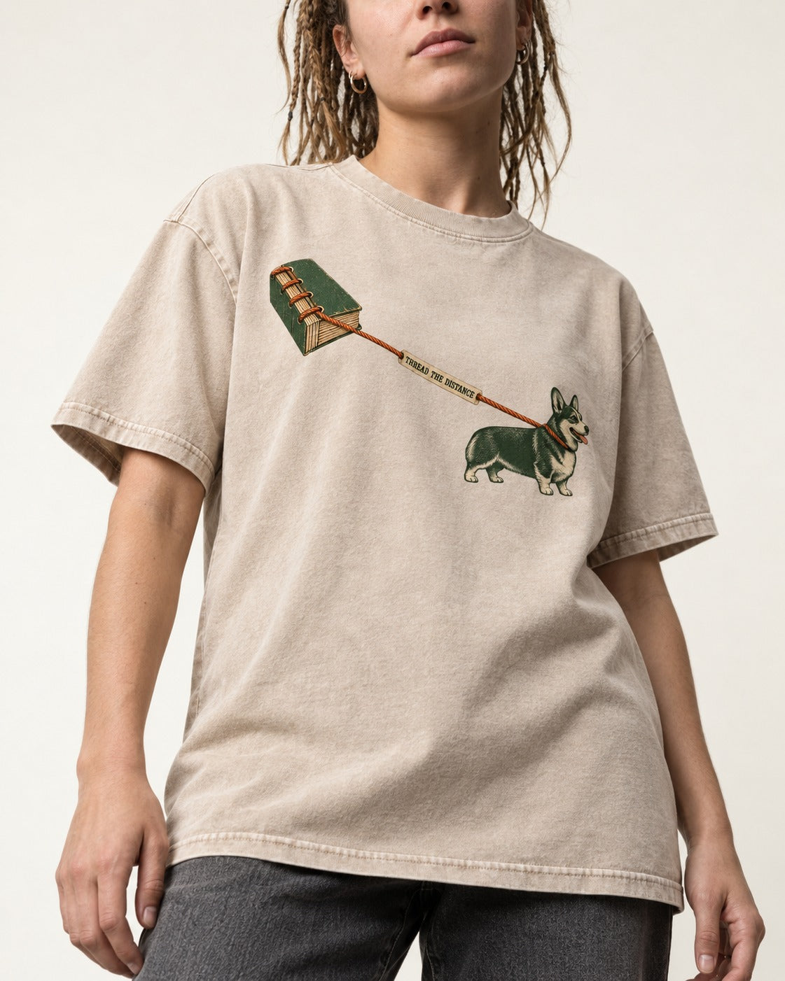 Thread the Distance with Corgi Washed Tee in Apricot, worn by a model, front view