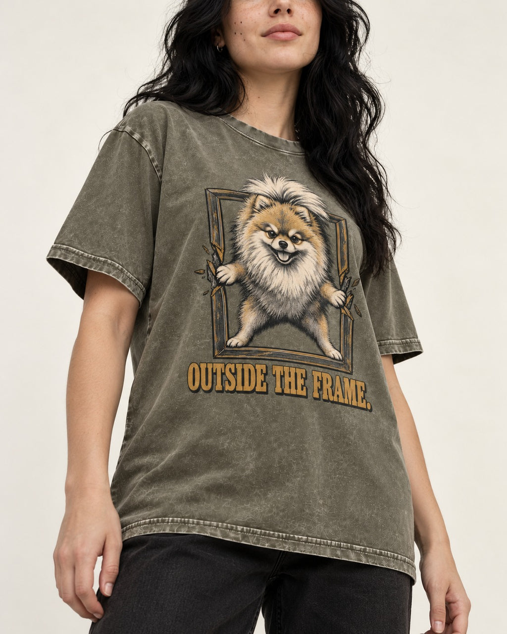 Pomeranian Outside the Frame Breakthrough Graphic Washed Tee in Army Green, worn by a model, front view