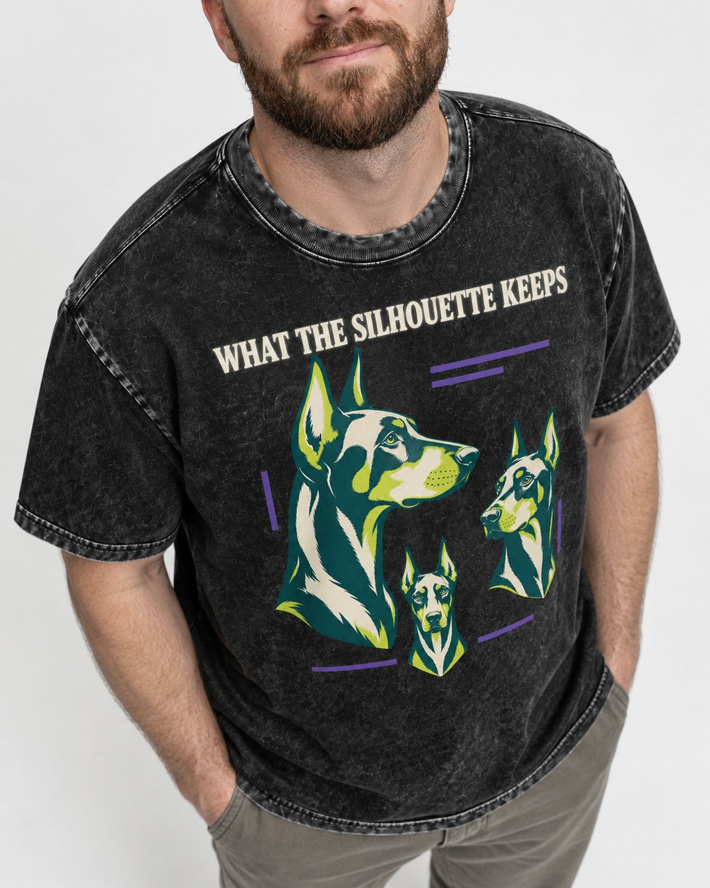 Doberman What the Silhouette Keeps Three Portrait Graphic Washed Tee in Black, worn by a model, front view