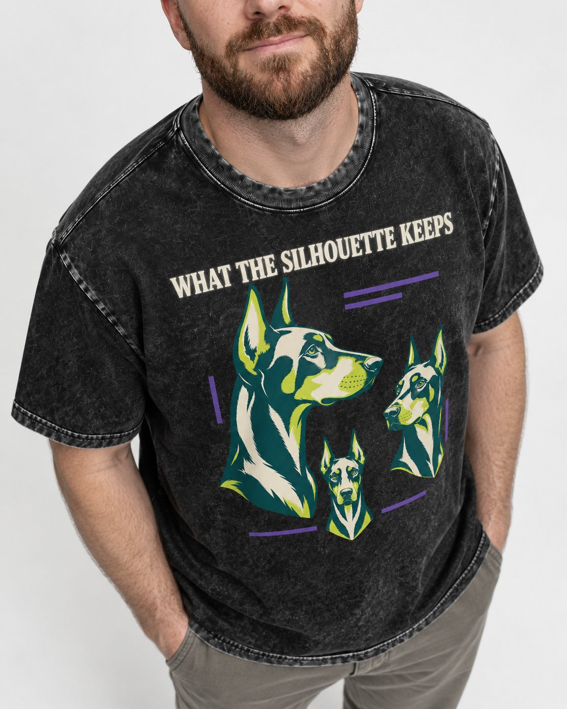 Doberman What the Silhouette Keeps Three Portrait Graphic Washed Tee in Black, worn by a model, front view