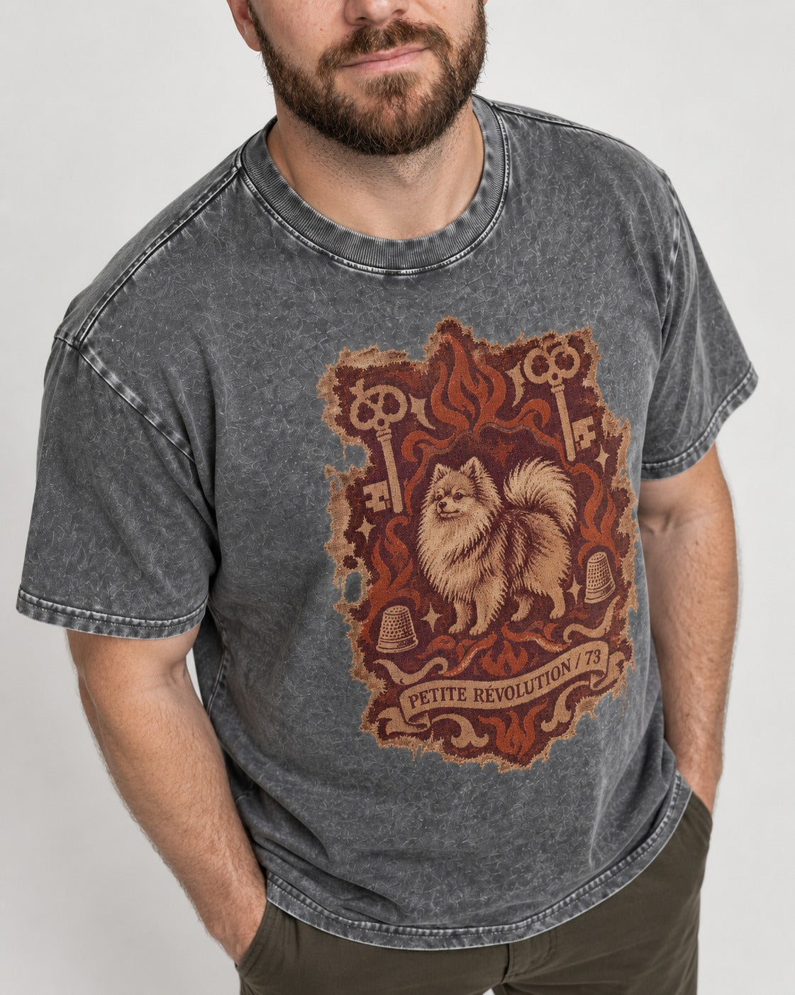Pomeranian Petite Revolution Ornate Key Emblem Graphic Washed Tee in Gray, worn by a model, front view
