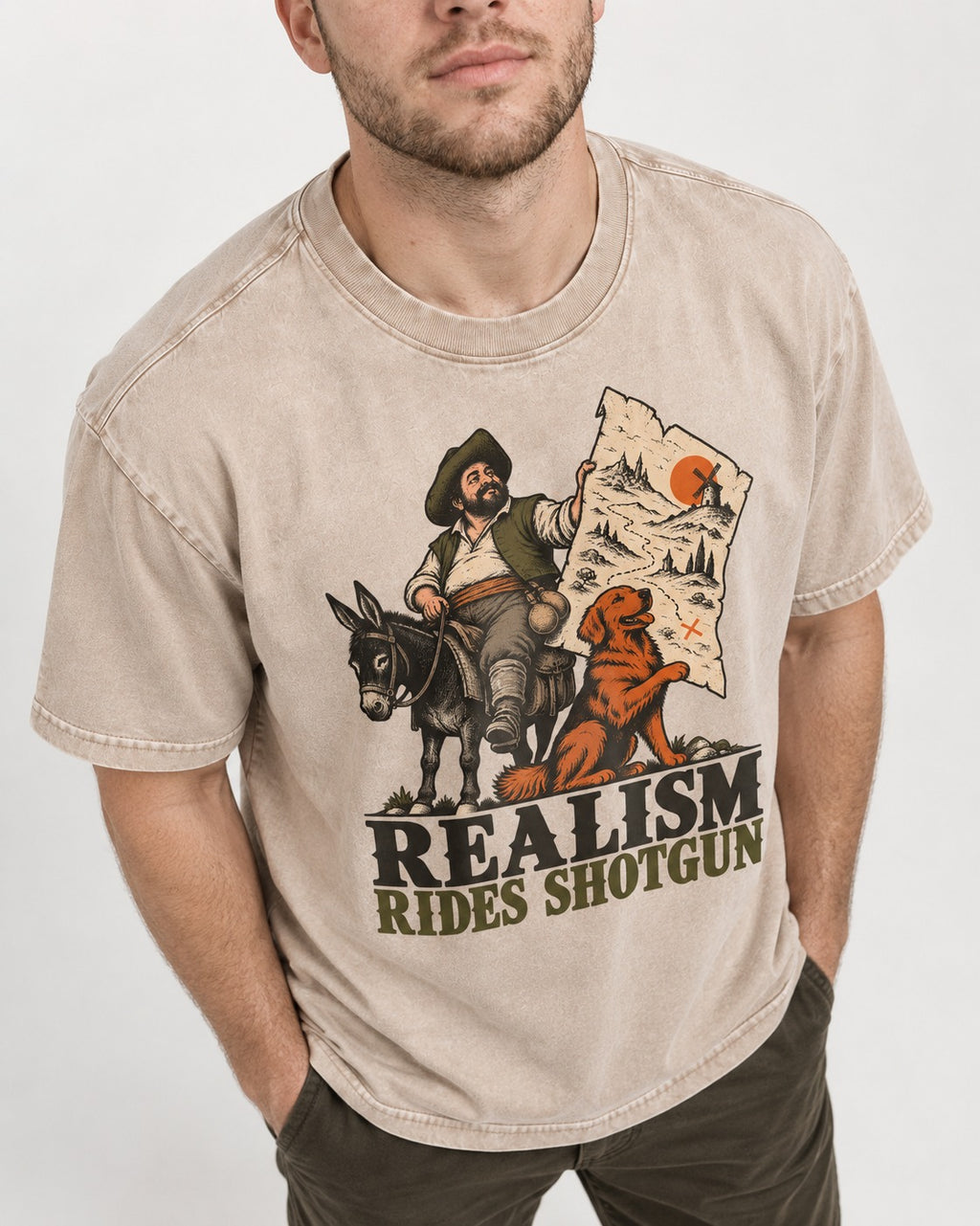 Realism Rides Shotgun with Golden Retriever Washed Tee in Apricot, worn by a model, front view