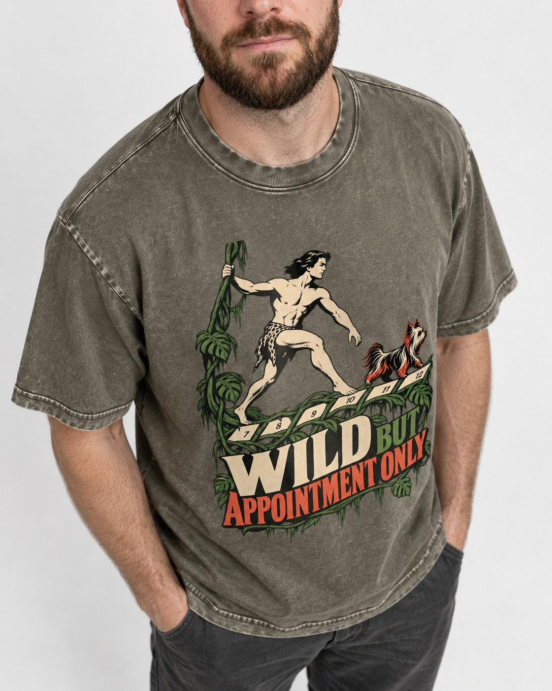 Yorkshire Terrier Wild but Appointment Only Jungle Calendar Graphic Washed Tee in Army Green, worn by a model, front view