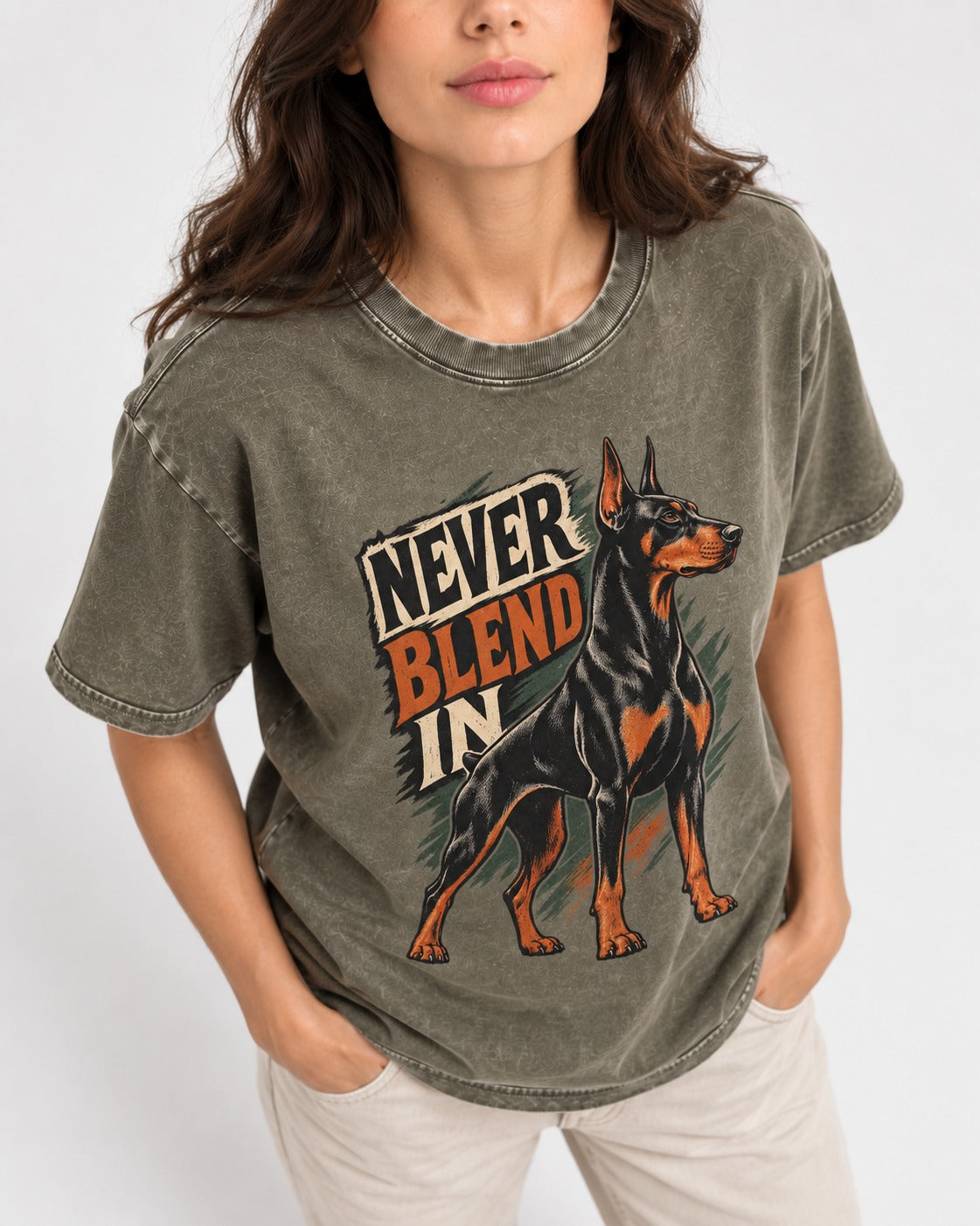 Doberman Never Blend In Brush Graphic Washed Tee in Army Green, worn by a model, front view