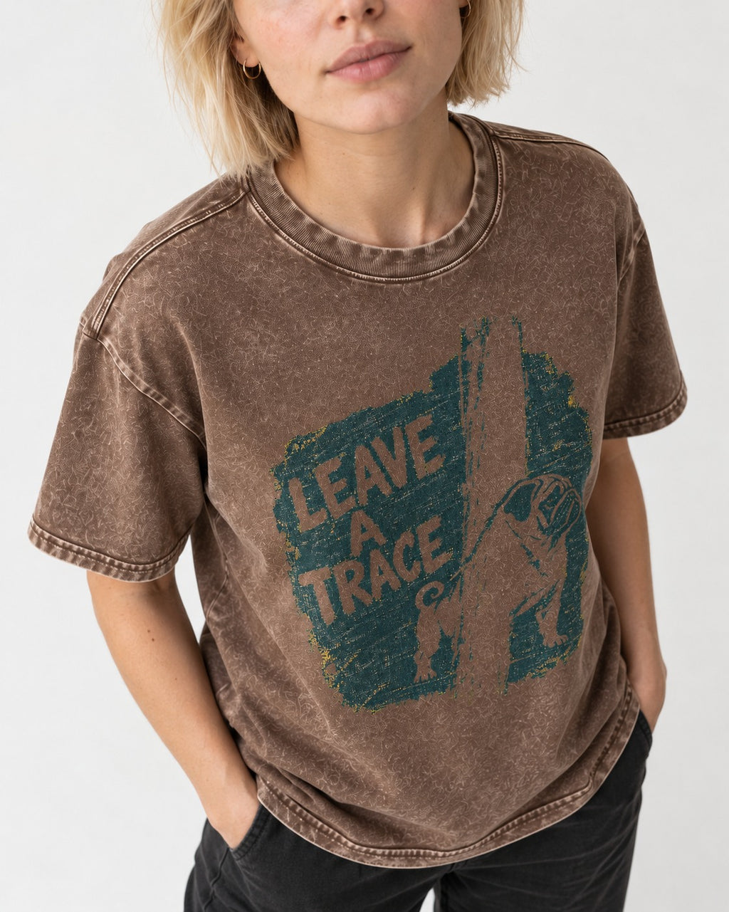 Pug Leaves a Trace Washed Tee in Coffee, worn by a model, front view