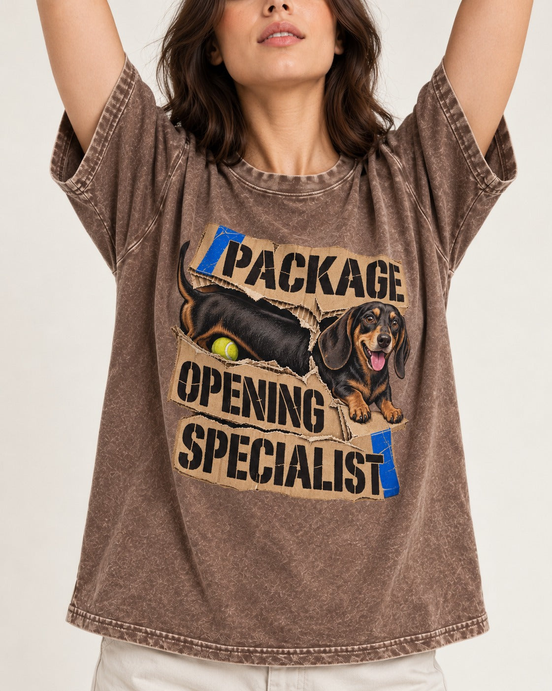 Dachshund Package Opening Specialist Washed Tee in Coffee, worn by a model, front view