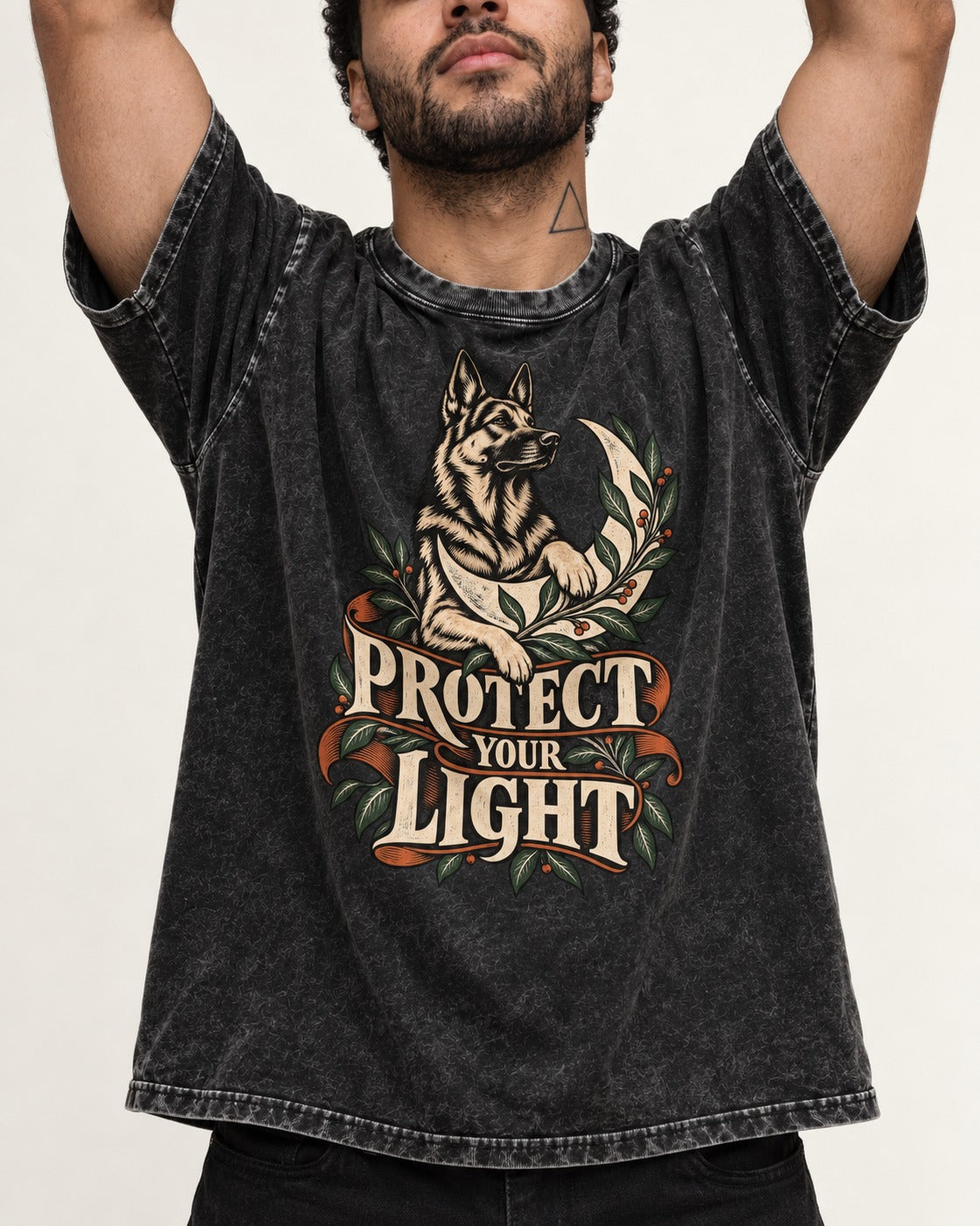 Protect Your Light Moon Botanical German Shepherd Dog Graphic Washed Tee in Black, worn by a model, front view