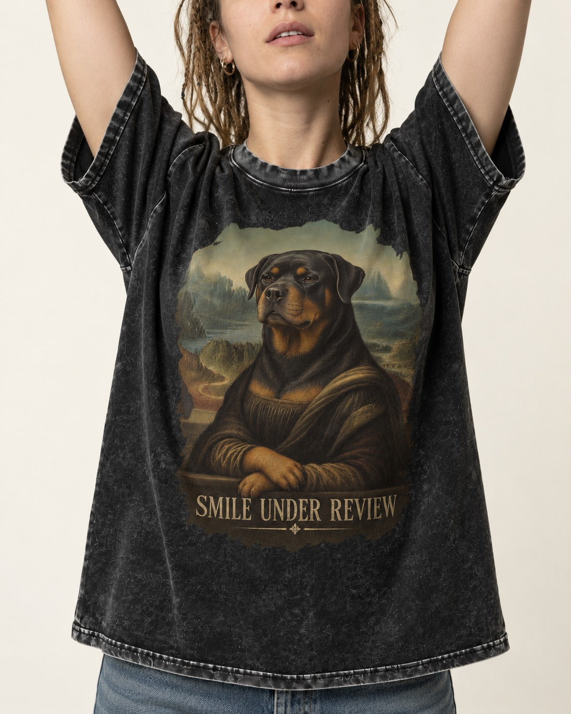 Rottweiler Smile Under Review Renaissance Portrait Graphic Washed Tee in Black, worn by a model, front view