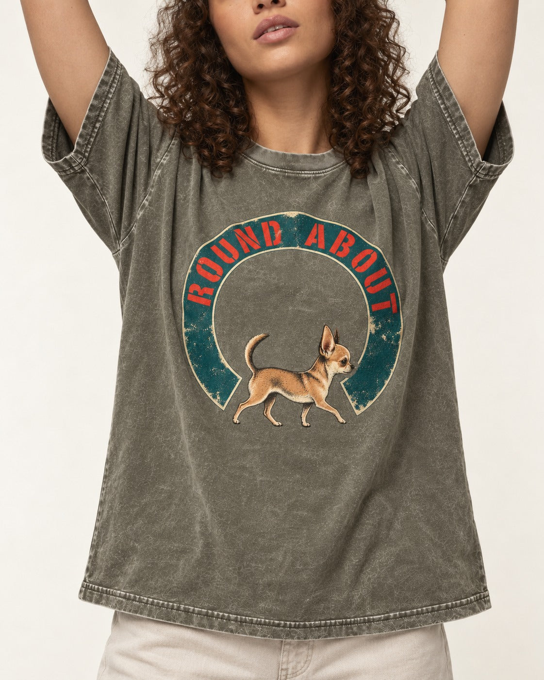 Round About Chihuahua Emblem Graphic Washed Tee in Army Green, worn by a model, front view