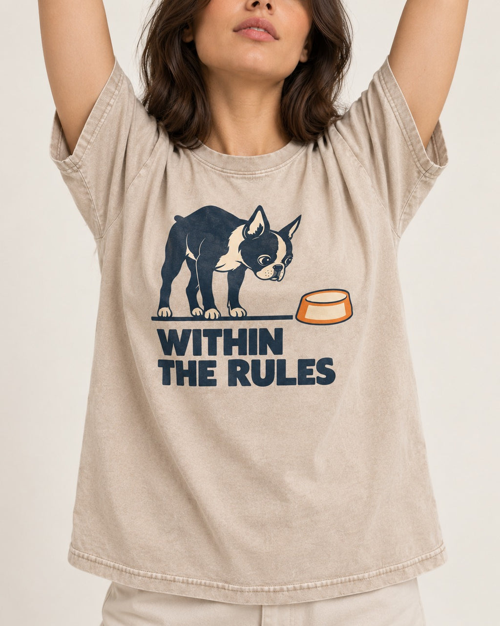 Within the Rules Boston Terrier Washed Tee in Apricot, worn by a model, front view