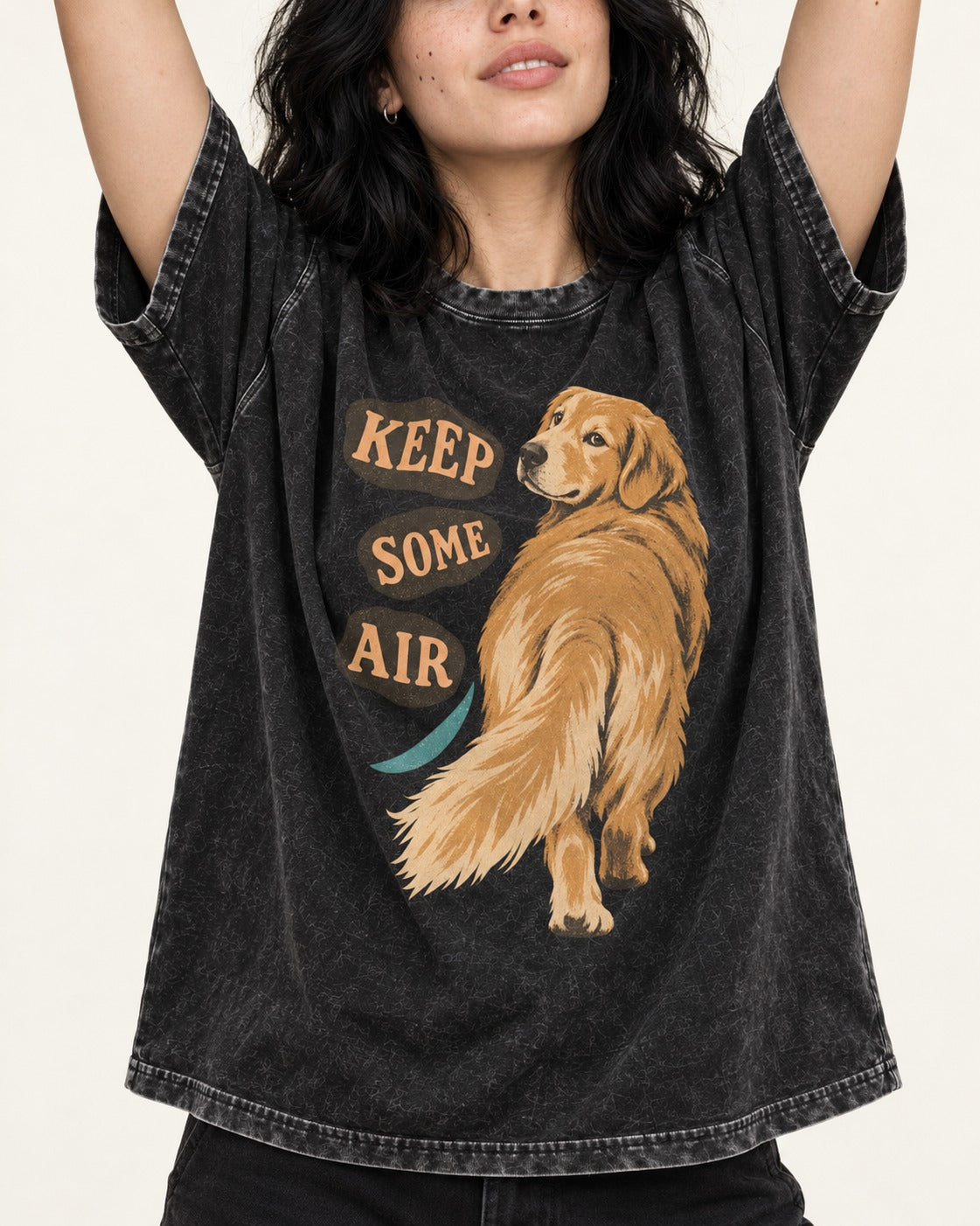 Golden Retriever Keep Some Air Looking Back Graphic Washed Tee in Black, worn by a model, front view