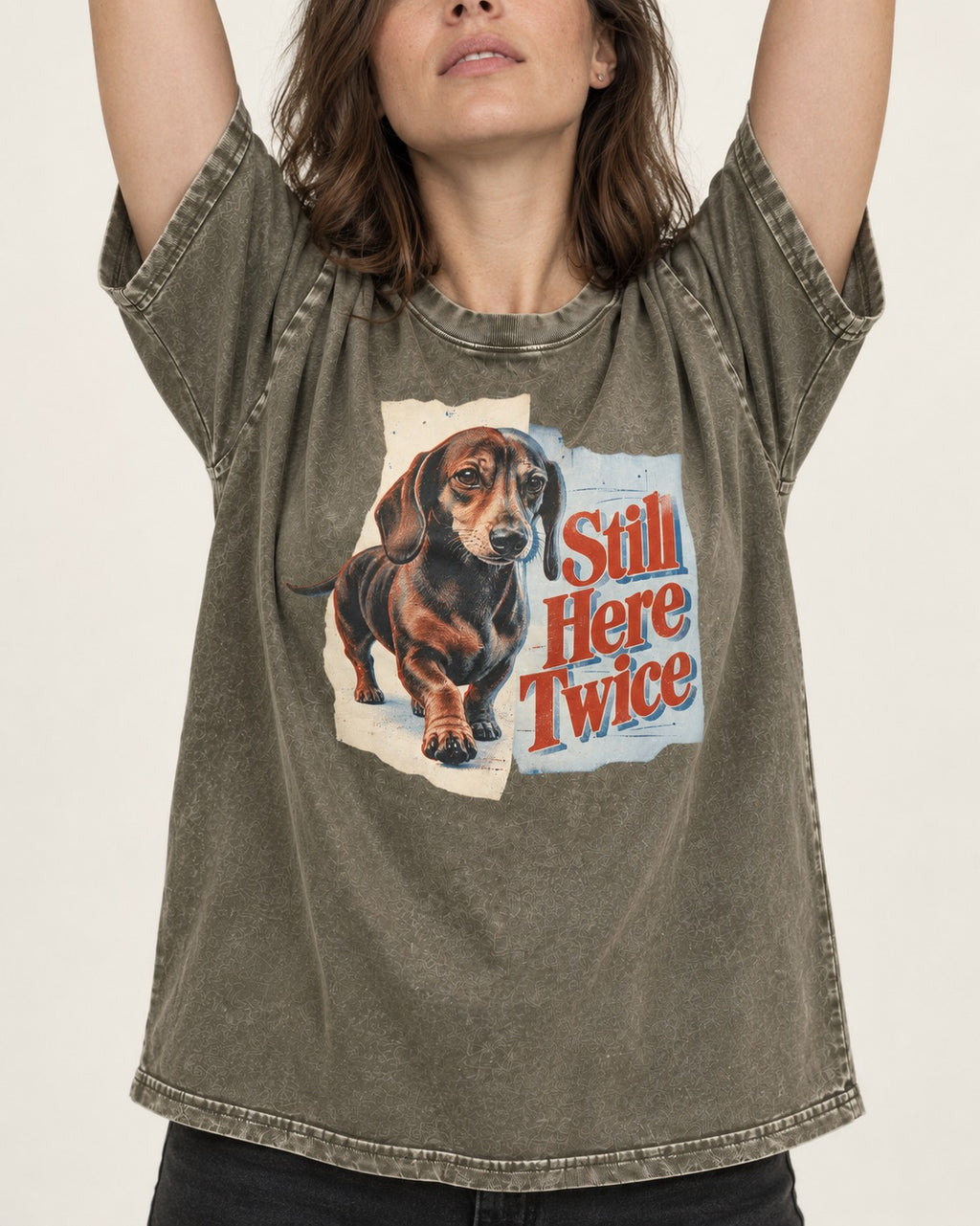 Dachshund Still Here Twice Torn Paper Graphic Washed Tee in Army Green, worn by a model, front view
