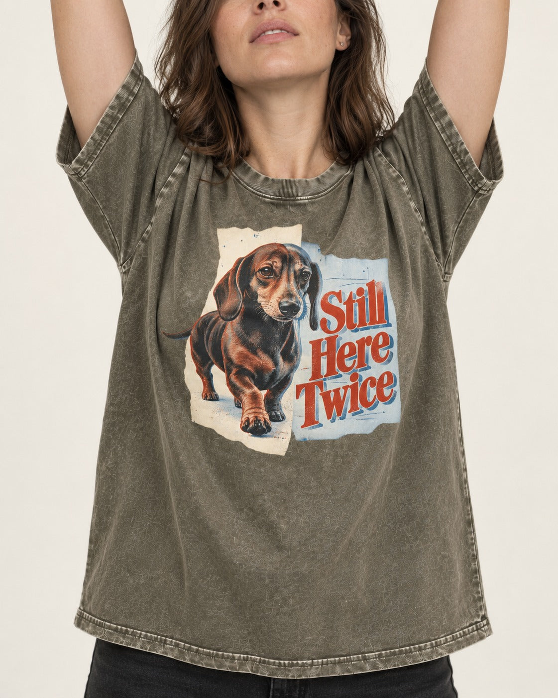 Dachshund Still Here Twice Torn Paper Graphic Washed Tee in Army Green, worn by a model, front view