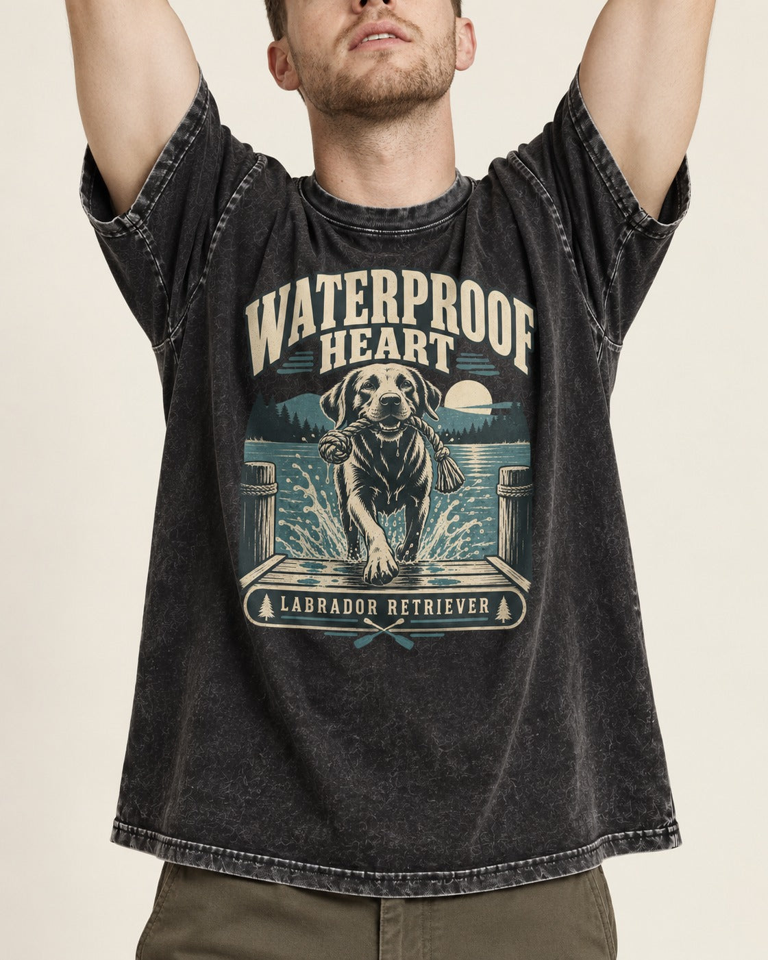 Labrador Retriever Waterproof Heart Lake Adventure Graphic Washed Tee in Black, worn by a model, front view