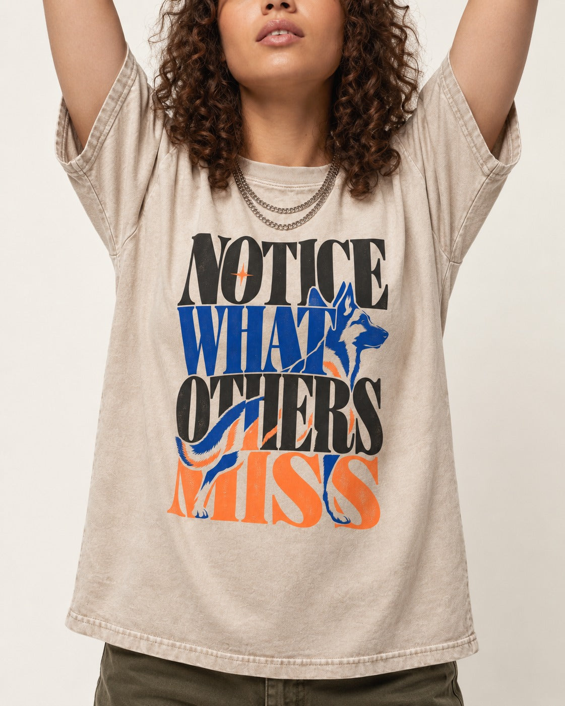 Notice What Others Miss German Shepherd Dog Washed Tee in Apricot, worn by a model, front view