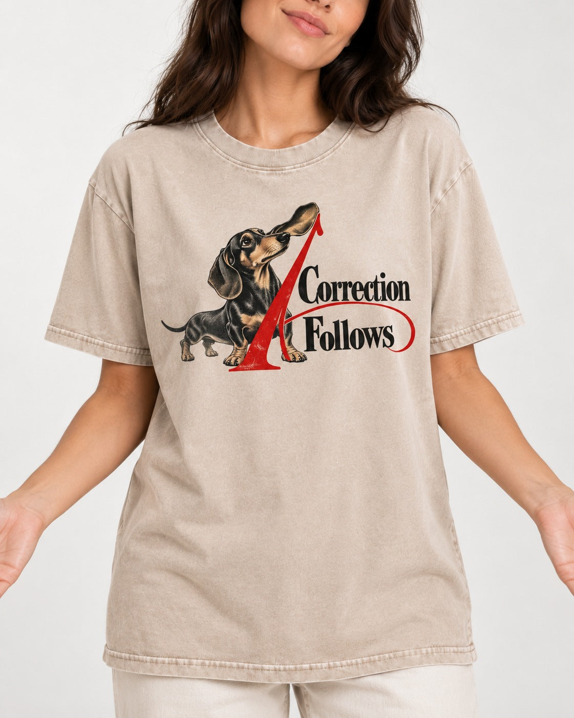 A Dachshund Correction Follows Washed Tee in Apricot, worn by a model, front view