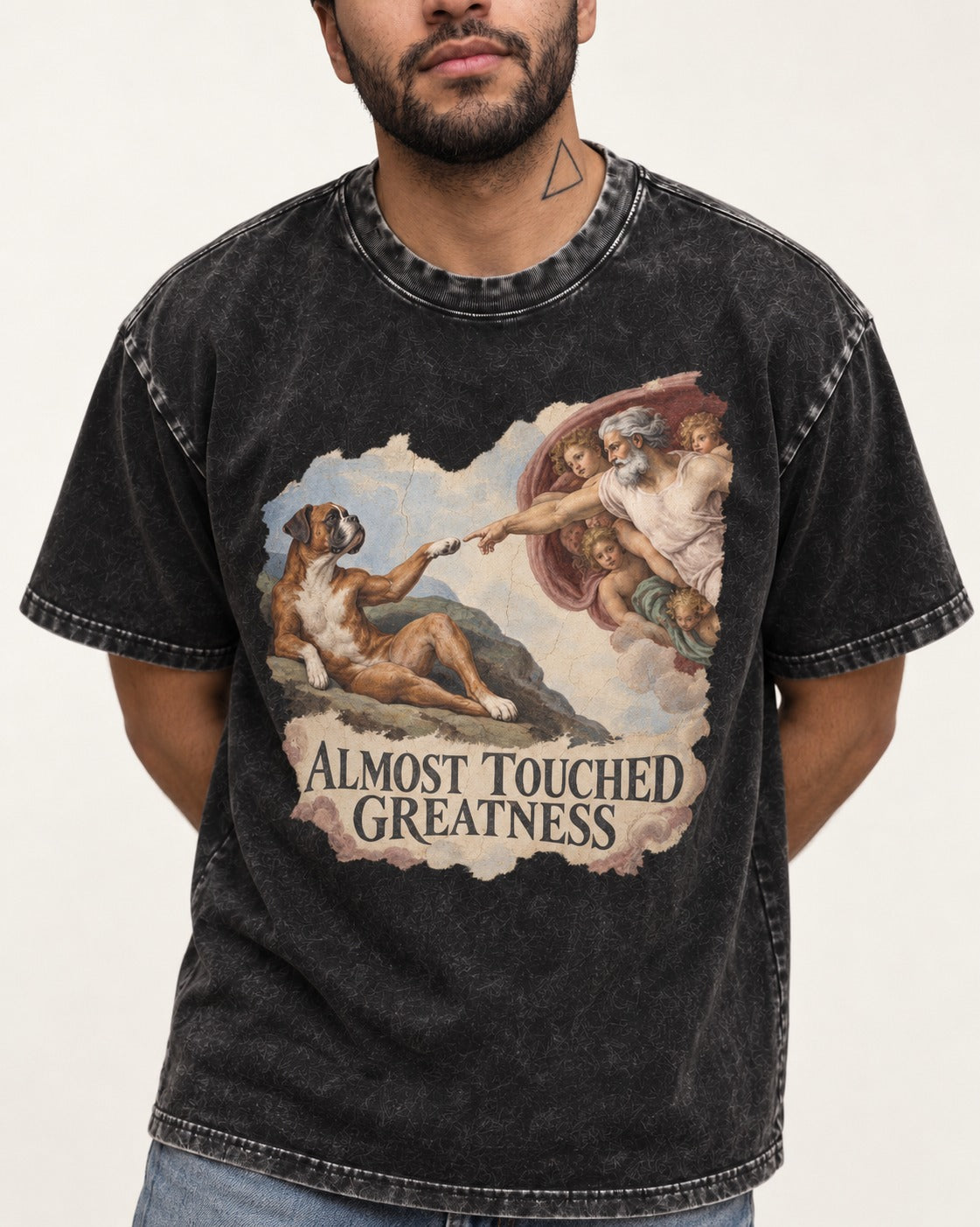 Almost Touched Greatness Boxer Creation Fresco Graphic Washed Tee in Black, worn by a model, front view