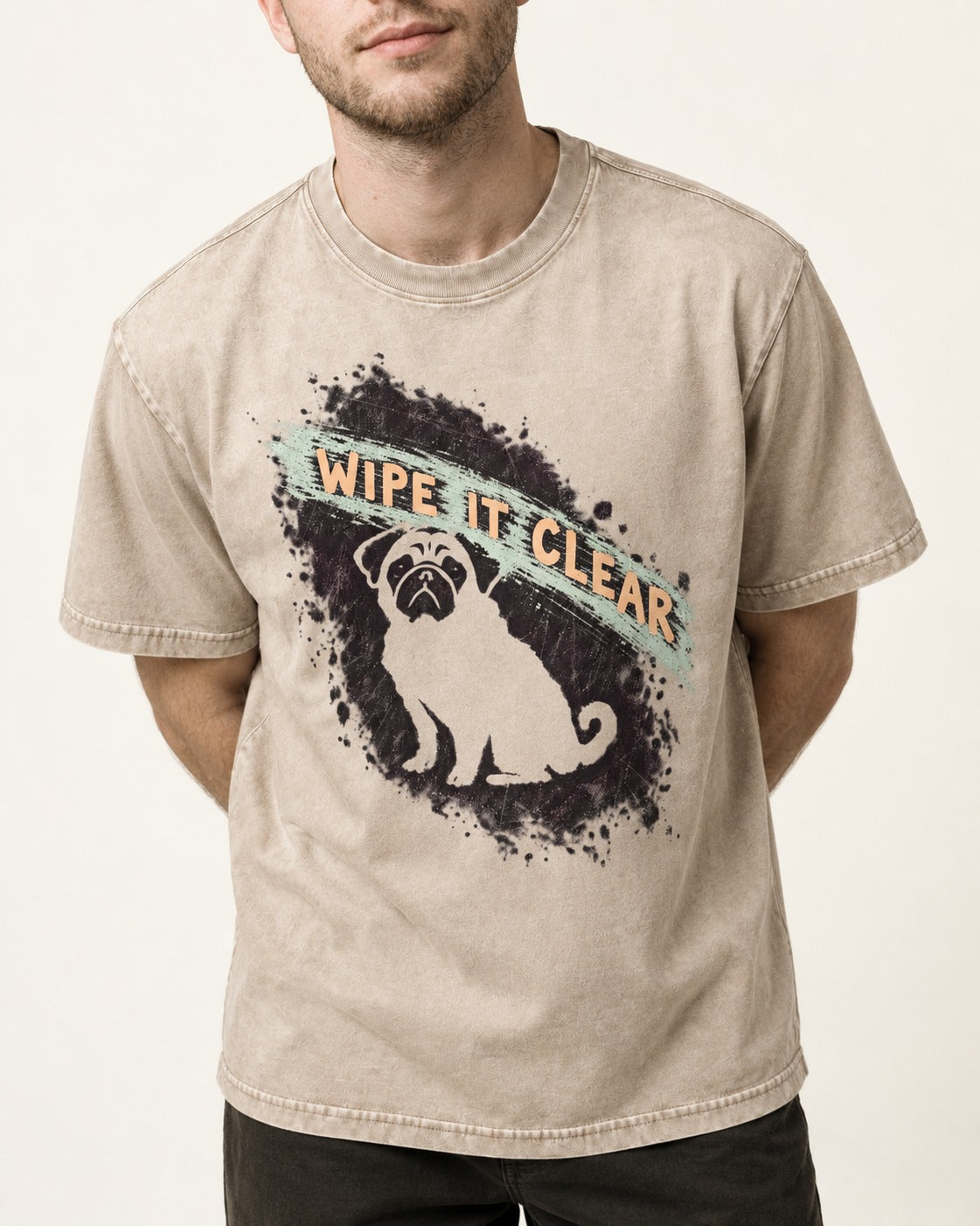 Pug Wipe It Clear Washed Tee in Apricot, worn by a model, front view