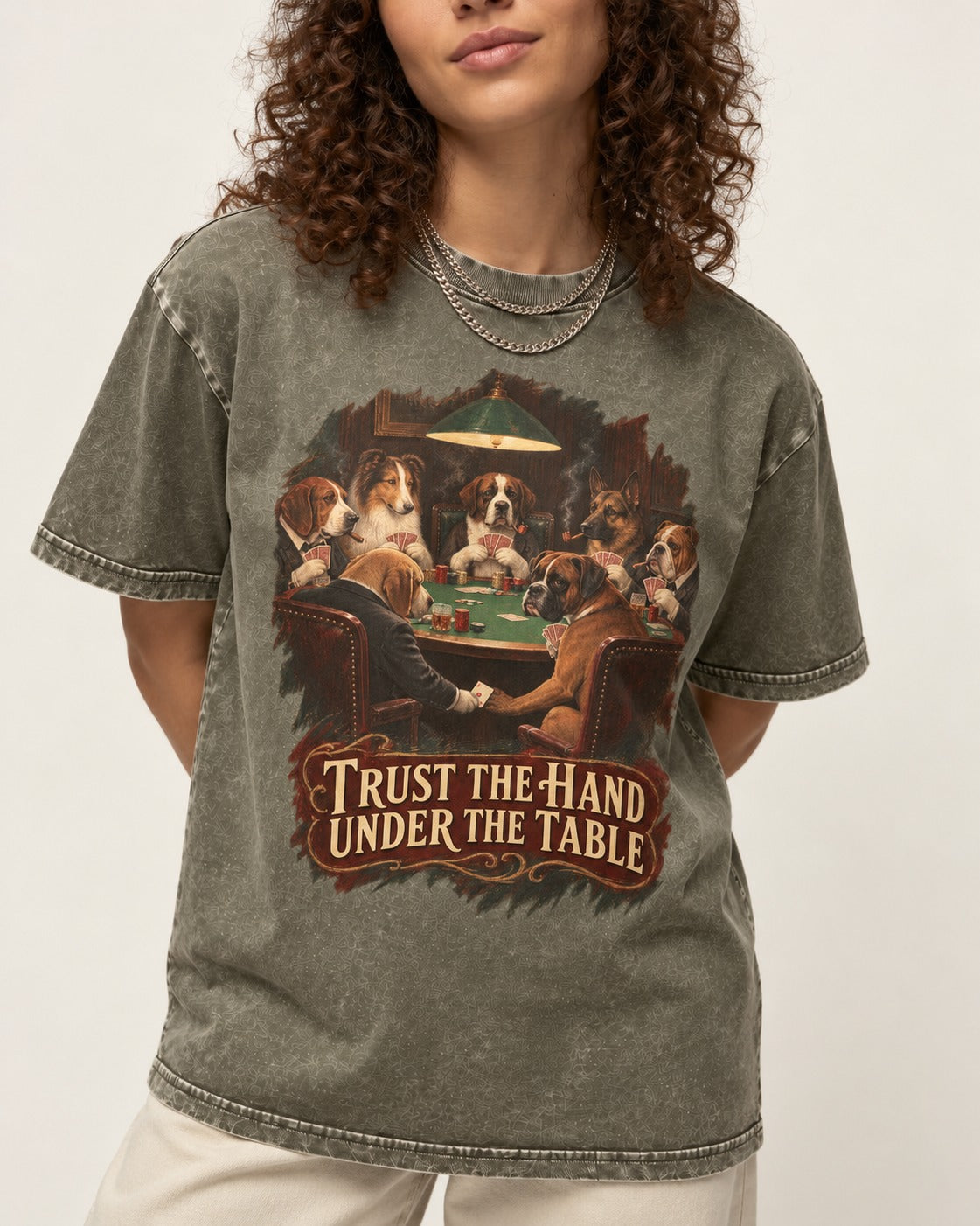 Trust the Hand Under the Table Boxer Poker Graphic Washed Tee in Army Green, worn by a model, front view